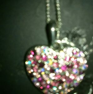 1 hello kitty pink earing and pink necklace